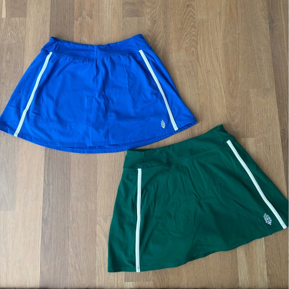 Free people tennis skirts with built in shorts. Both skirts for total $25 - Picture 1 of 1